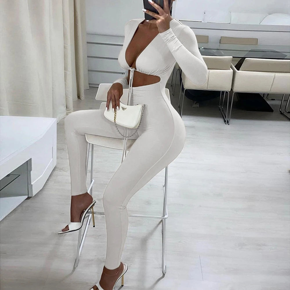 Fashionable new solid color tight fitting sexy exposed navel lace up hollow long sleeved slim fit jumpsuit